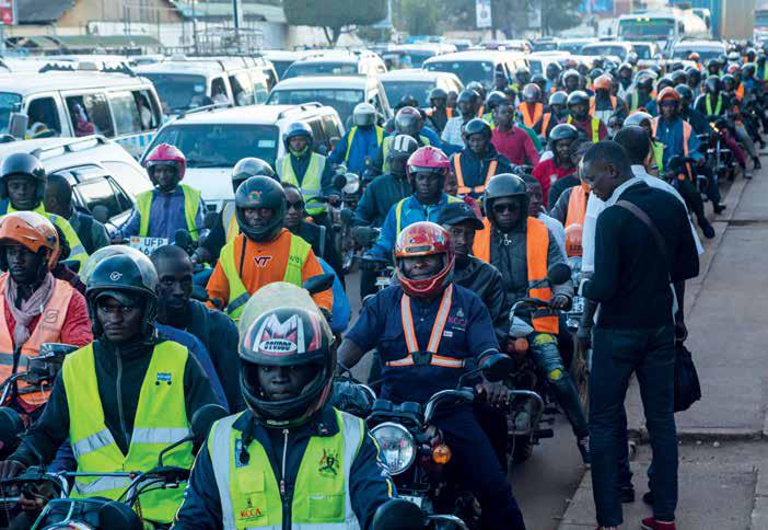 A remarkably thick queue of boda bodas in a Kampala street. © Badru Katumba