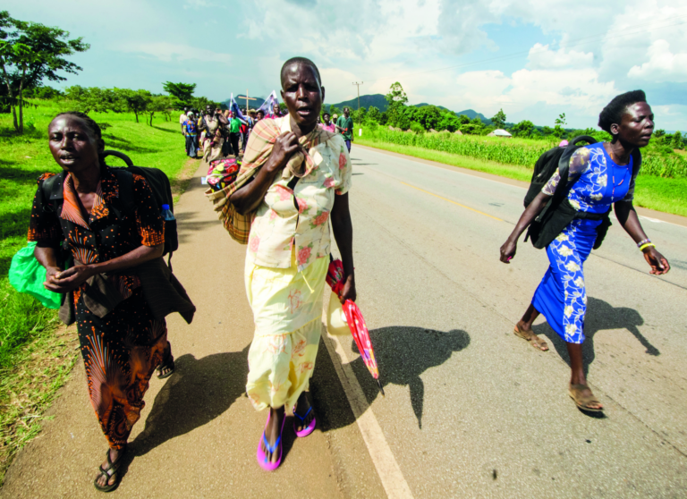 Pilgrims trekking to the Basilica of Uganda Martyrs in Namugongo. © Badru Katumba