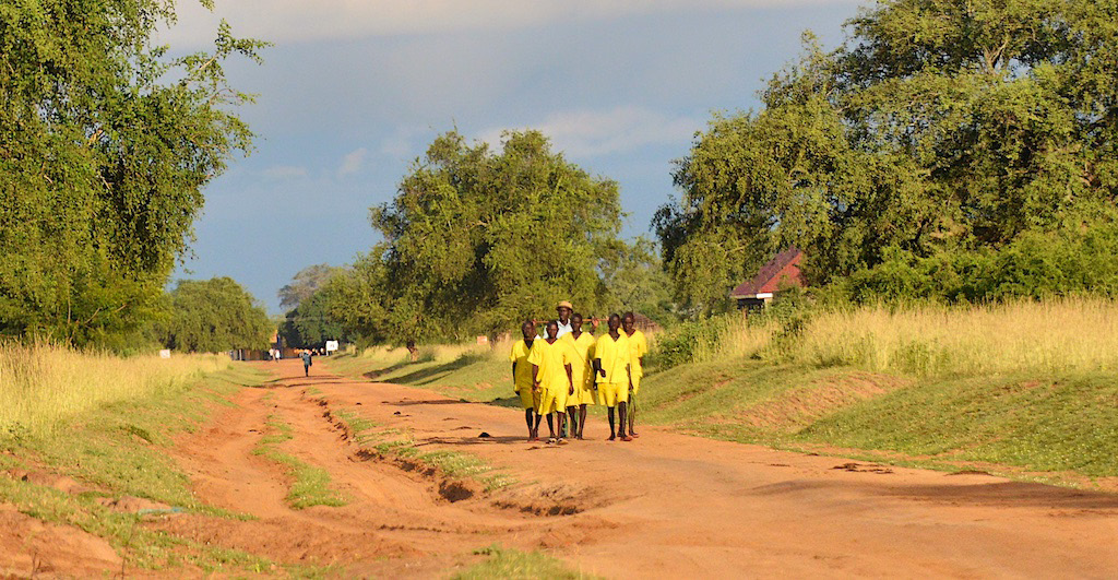 A group of Ugandan prisoners, public domain, via Wikimedia Commons.