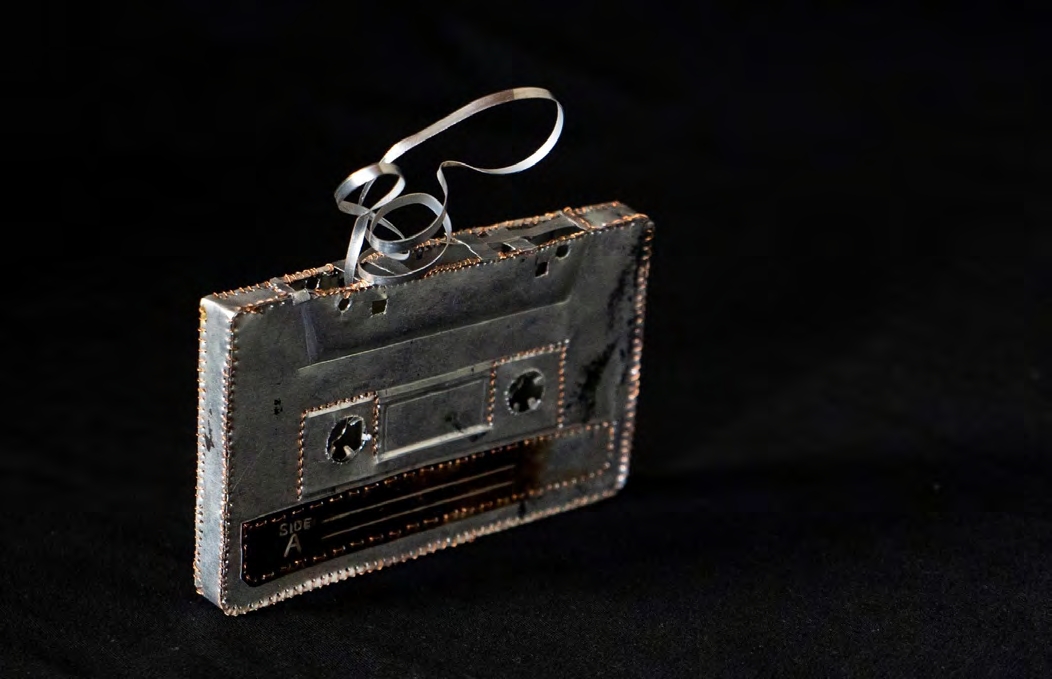 Ronald Odur, Casette Tape (Ebyakaisaali), 2020, aluminum plate and copper wire, 10 x 5 cm